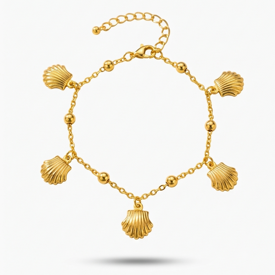 18kt gold plated bracelet with shell charms floated on a white background.