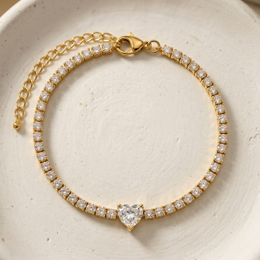 18k gold plated tennis bracelet featuring a row of CZ diamonds and a prominent heart-shaped center diamond.