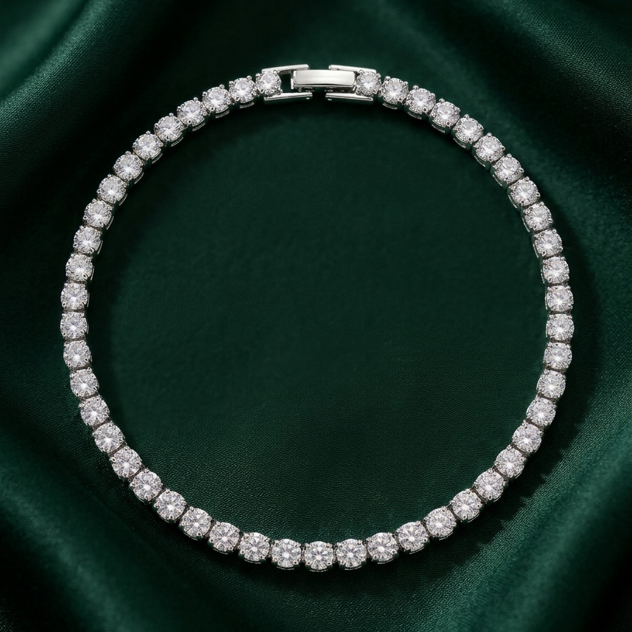 premium silver-tone rhodium plated tennis bracelet featuring a continuous row of sparkling CZ diamonds and a secure box clasp on a dark green fabric background