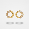 Gold hoop earrings with clear gemstones on a light gray background