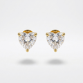 18k gold plated stud earrings featuring a clear, sparkling heart-shaped diamond on light grey background.