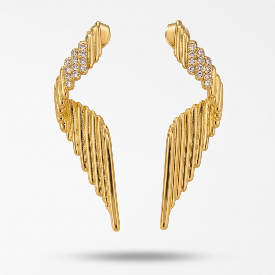 Pair of large 18k gold plated statement drop earrings with a ribbed wing texture and CZ diamond accents at the top on a light gray background