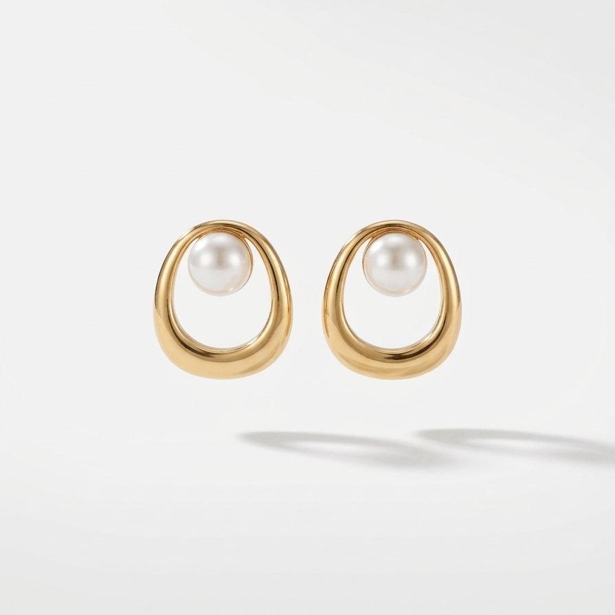 18k gold plated stud earrings featuring an open oval design with a single white pearl.