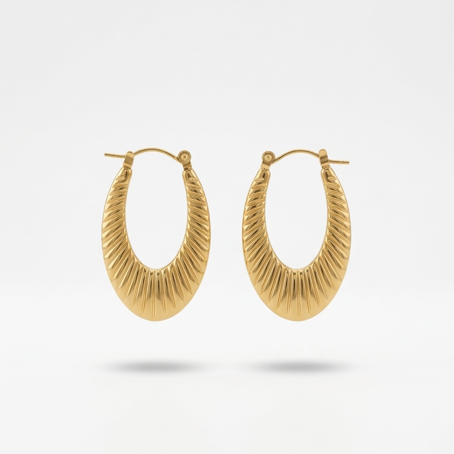 18k gold plated elongated oval hoop earrings featuring a ribbed croissant texture 