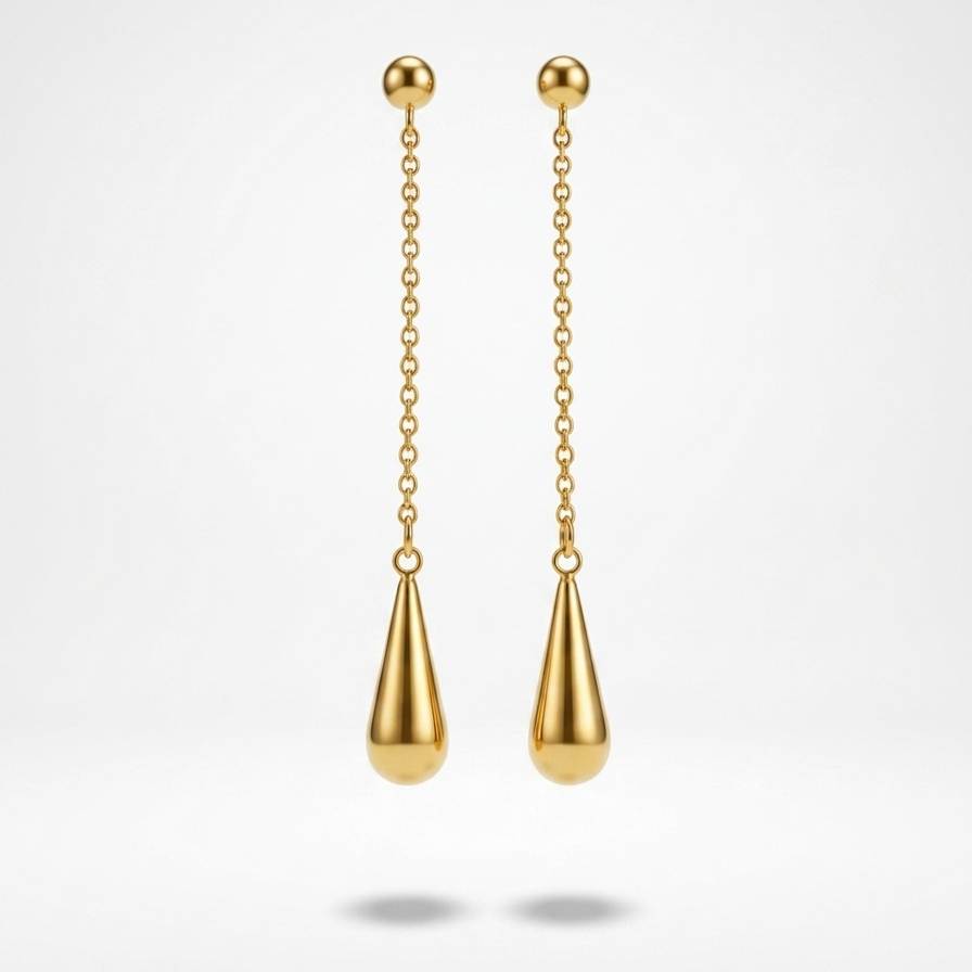 A pair of gold dangle earrings with spherical studs, short chain links, and teardrop-shaped drop pendants, shown against a light gray gradient background.