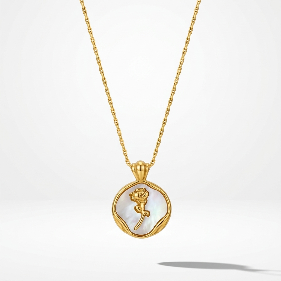 18k gold plated medallion necklace featuring a mother of pearl inlay and a raised golden rose motif in the center.