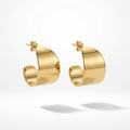 18kt gold plated wide sculpted earrings on a light gray background.