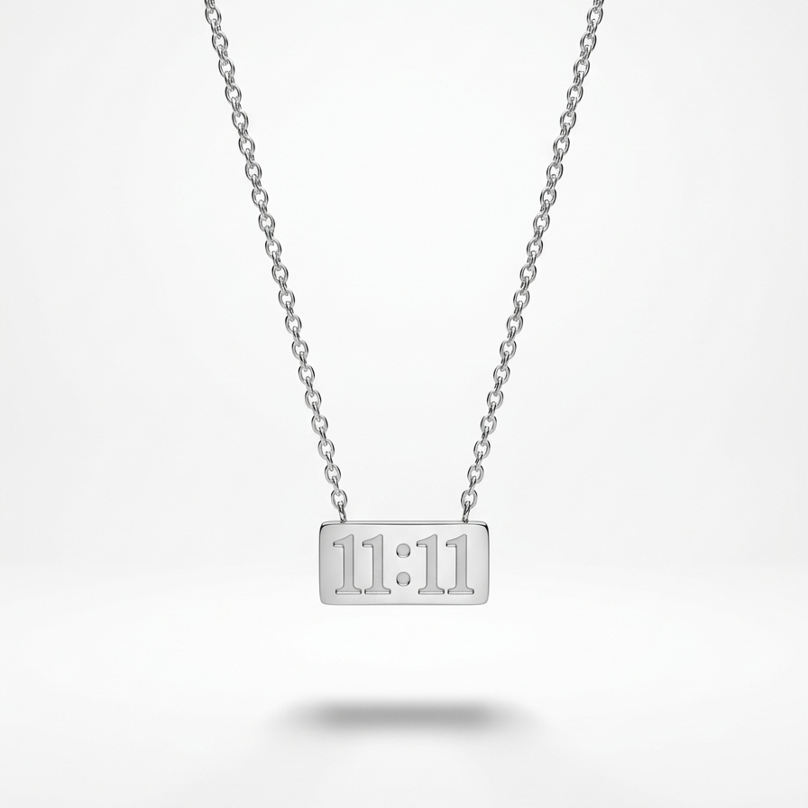 Silver-tone rhodium plated necklace featuring a horizontal rectangular bar pendant engraved with the numbers 11:11.