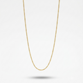 A delicate gold ball chain necklace suspended against a clean white background with a soft shadow beneath.