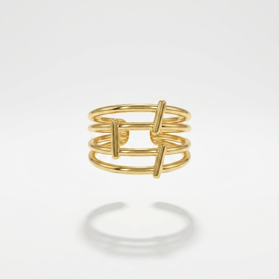 A gold multi-band ring with a modern, open interlocking design, shown floating against a clean white background with a soft reflection below.