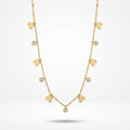 A delicate gold necklace featuring small flower motifs and a central round clear stone, displayed against a clean white background.