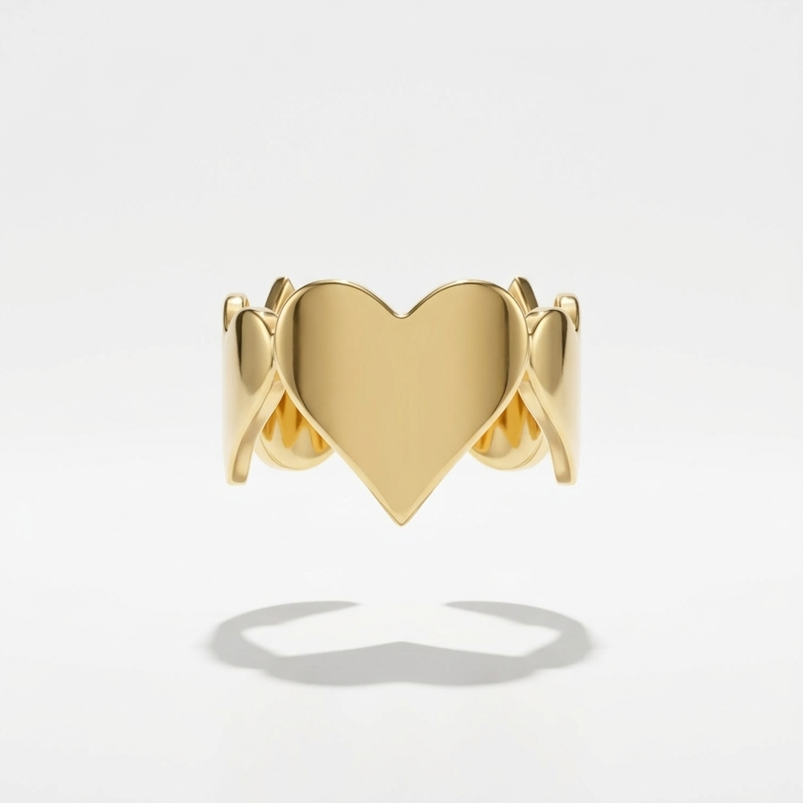 18kt gold plated heart-shaped ring floating on a light gray background