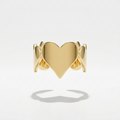 18kt gold plated heart-shaped ring floating on a light gray background