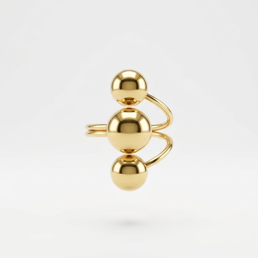 18kt gold plated ring with three spherical beads fon a white background