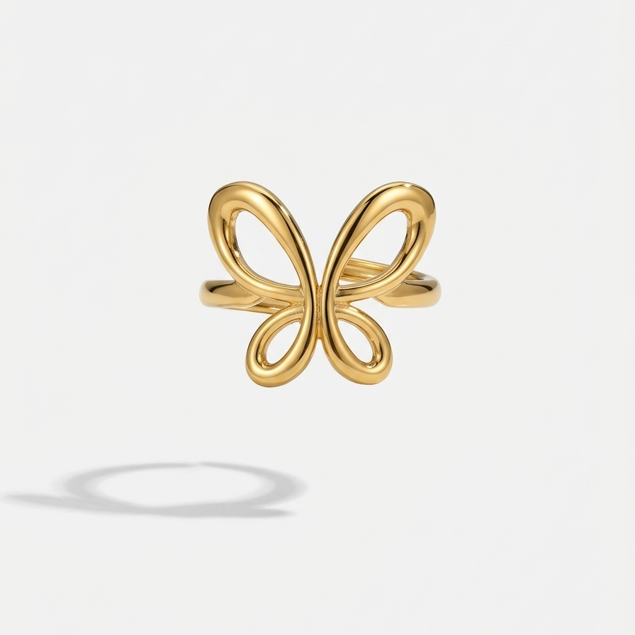 18kt gold plated butterfly-shaped ring on a light gray background