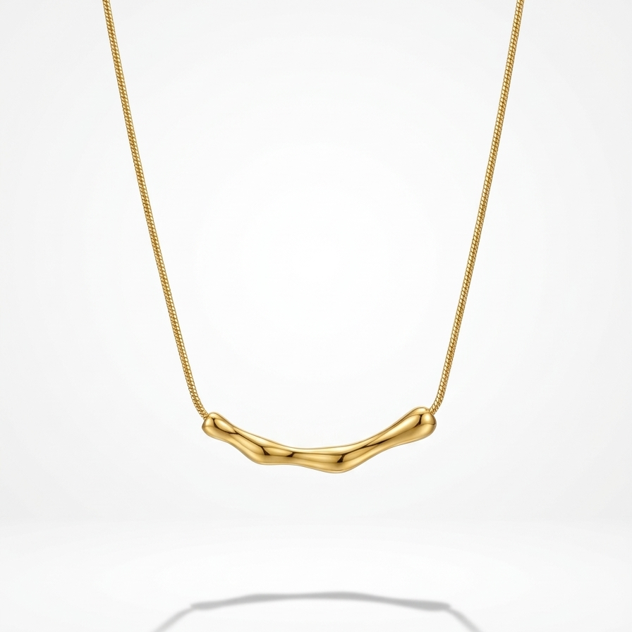 18kt gold plated bamboo bar necklace floating on a white background.