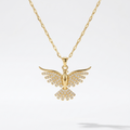 18kt gold plated crystal bird pendant necklace floating on a light gray background.