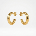 18kt gold plated everyday tube hoops floating on a white background.