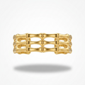 18kt wide gold plated, waterproof cuff bracelet with openwork bamboo design floating on white background.