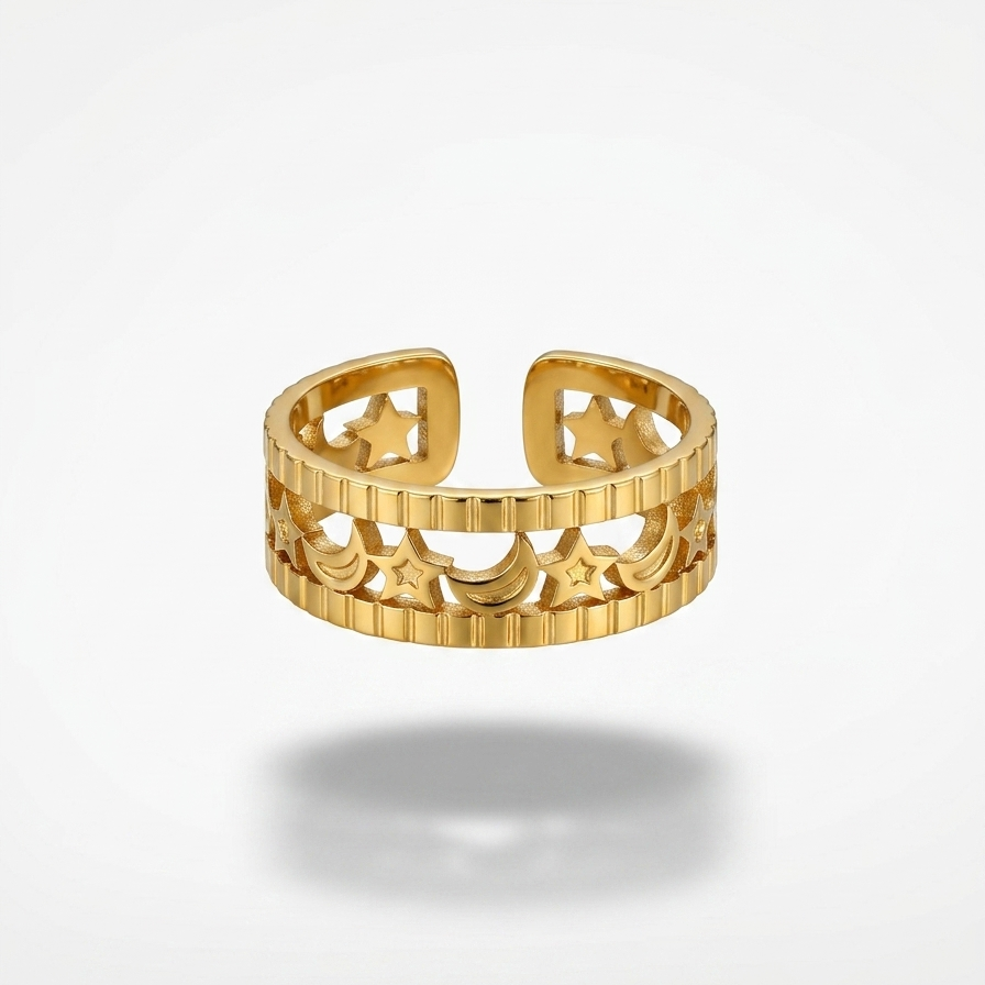 A gold-toned open bangle ring with a textured, ribbed outer band and star-shaped cutouts, shown floating on a light gray background with a soft shadow underneath.
