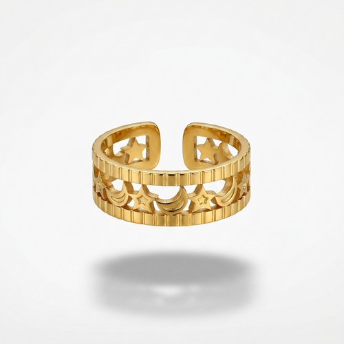 A gold-toned open bangle ring with a textured, ribbed outer band and star-shaped cutouts, shown floating on a light gray background with a soft shadow underneath.