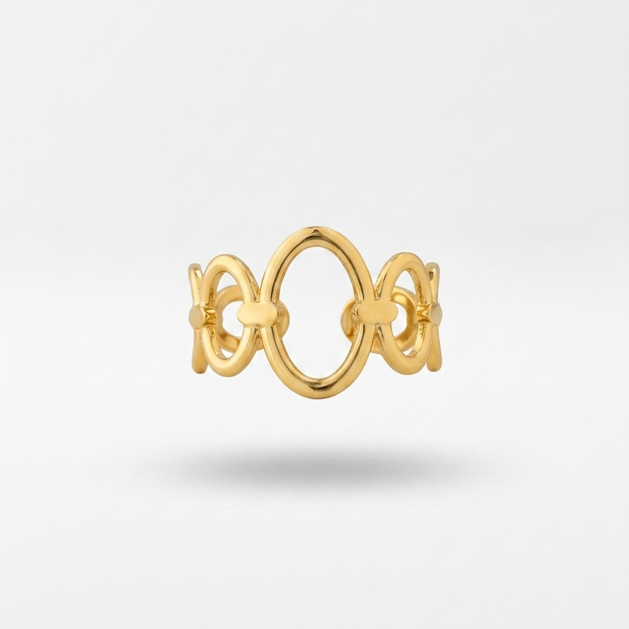 A gold ring with a continuous interlocking circular and floral-like openwork design, shown floating against a light gray background with a soft shadow underneath.