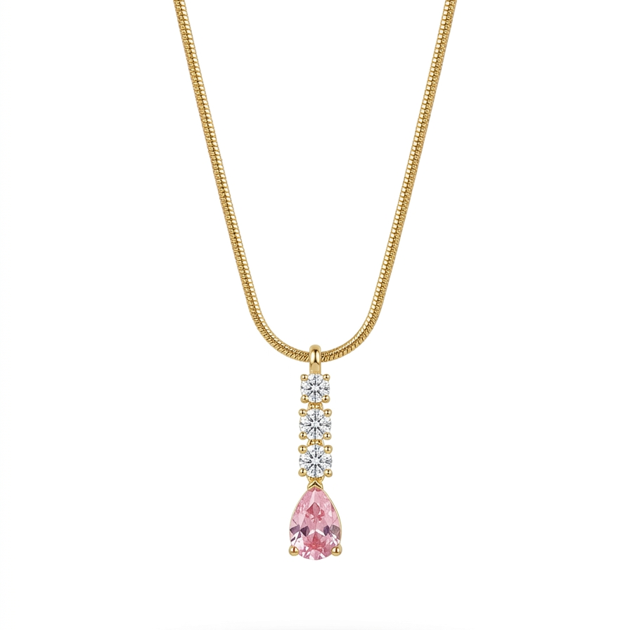 A gold chain necklace with a pendant featuring a pear-cut pink gemstone and a small vertical row of clear stones above it, shown on a white background with a soft shadow.