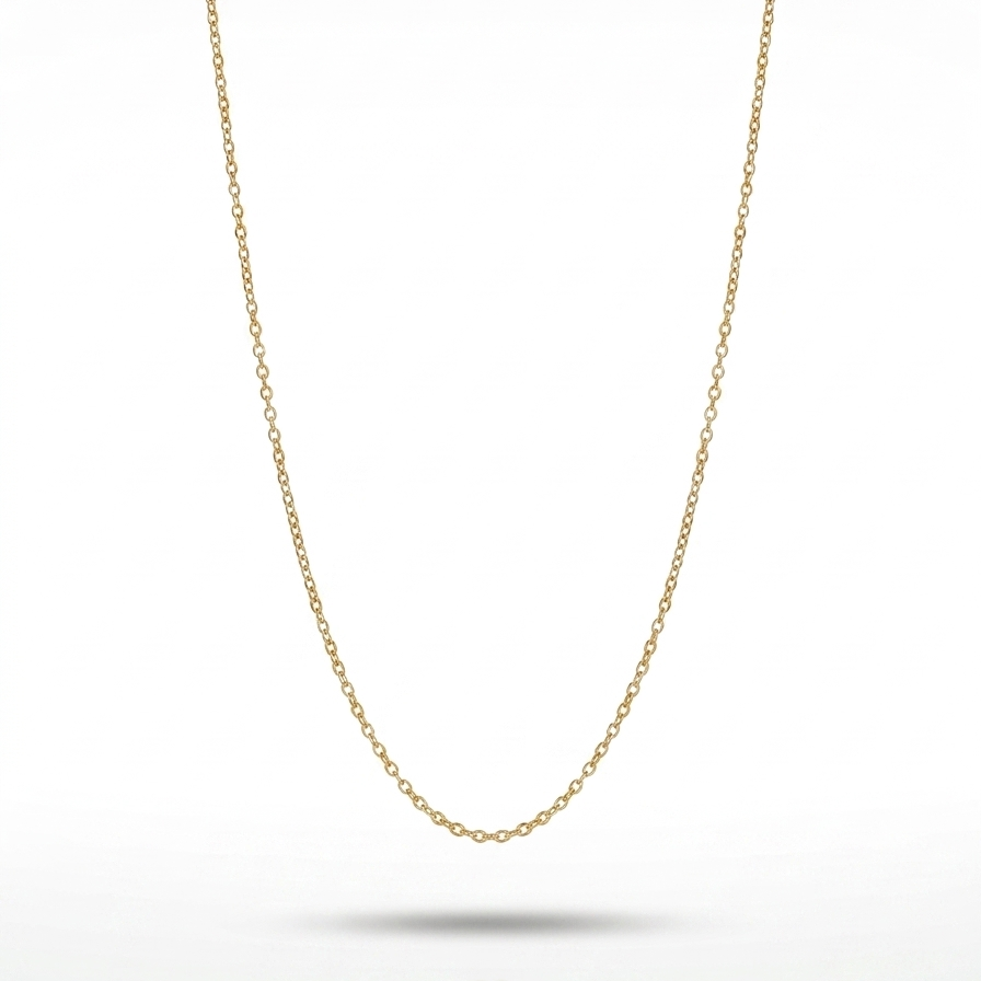 A delicate gold chain necklace suspended against a clean white background with a soft reflection below.