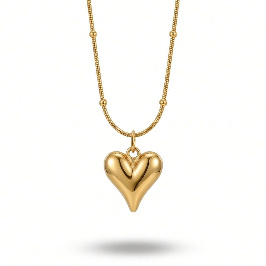 18k gold plated necklace featuring a smooth, 3D puffy heart pendant suspended on a delicate beaded satellite chain.