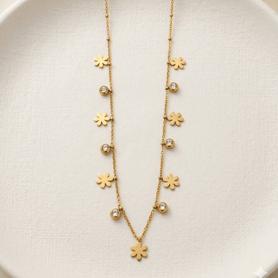 18k gold plated station necklace featuring evenly spaced minimalist daisy charms and bezel-set clear CZ crystals.