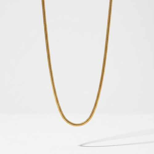 18k gold plated foxtail layering chain showing intricate woven V-shaped links and an adjustable extender clasp.